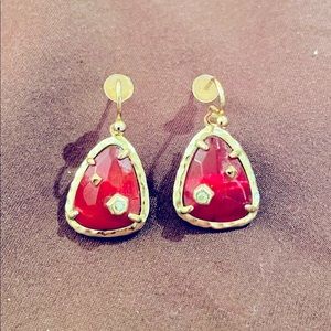 Maroon Kendra Scott earrings with diamond accents